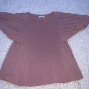 dusty pink shirt with flowy arms